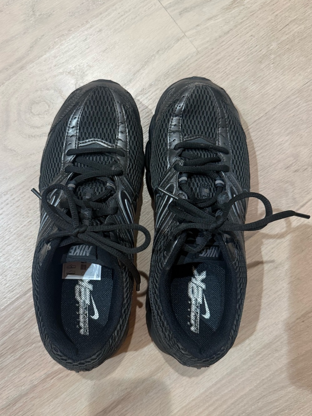 Nike black air max moto 2K sneakers
